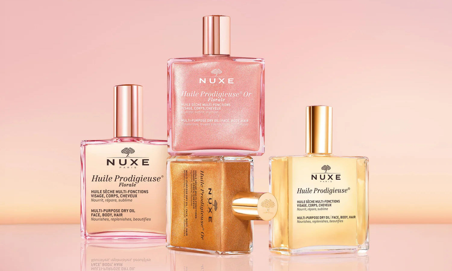 Nuxe skincare products on a pink background