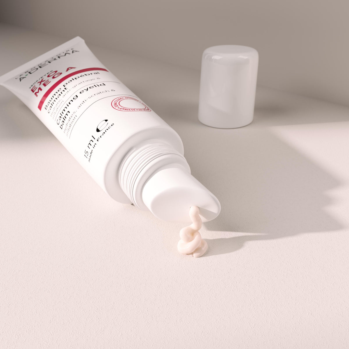 A-Derma Exomega, balm squeezed from the beveled applicator tip