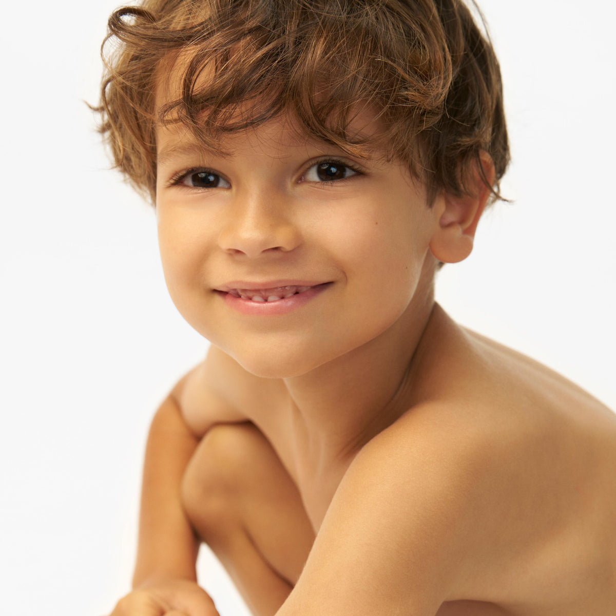 A-Derma Exomega Control, smiling child on a white background