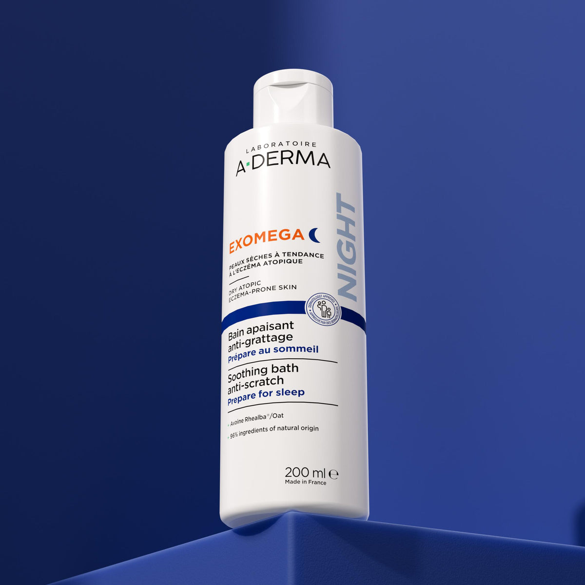 A-Derma Exomega Control 200ml, flip-top bottle on a blue pedestal