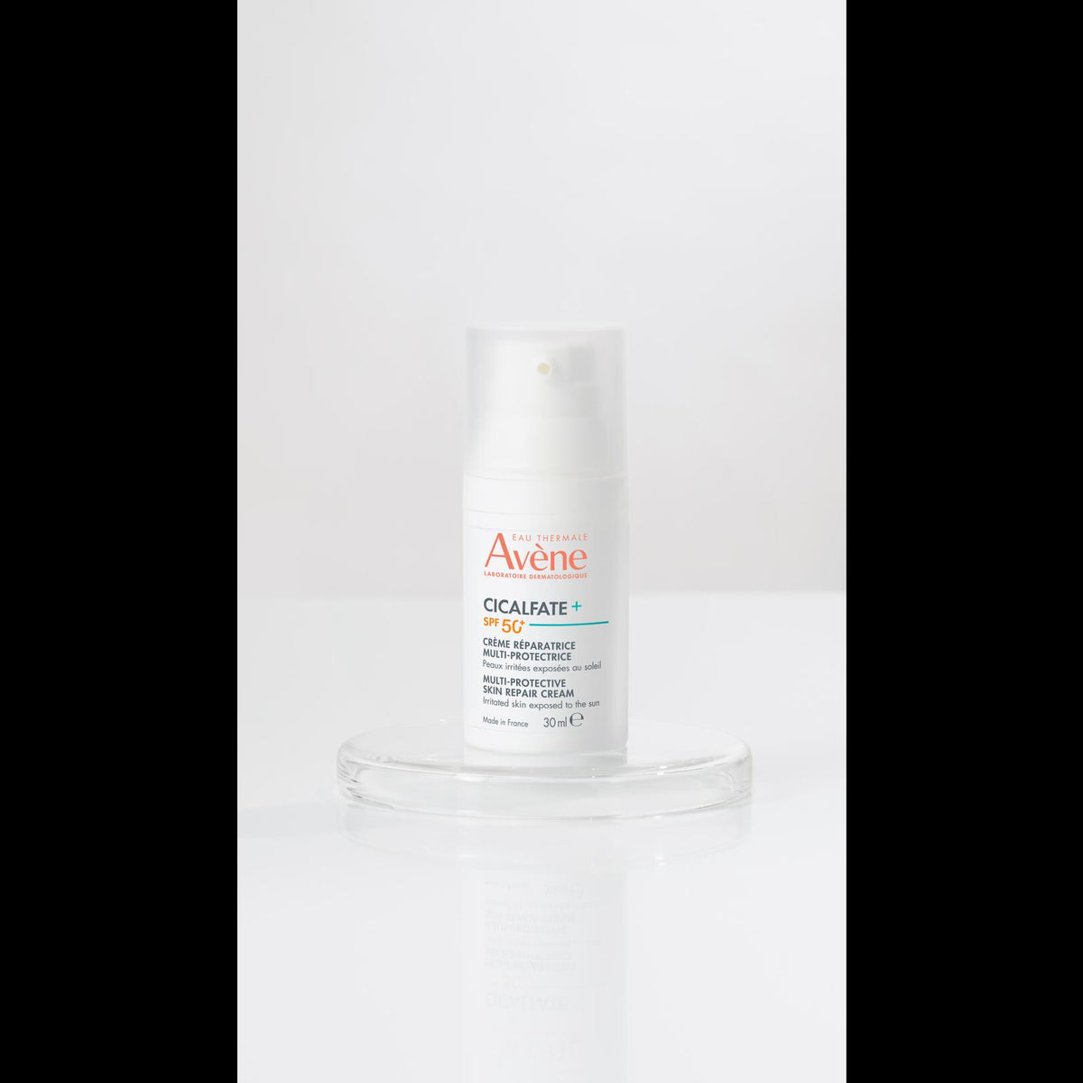 Avène Cicalfate+, pump bottle standing on a glass disc