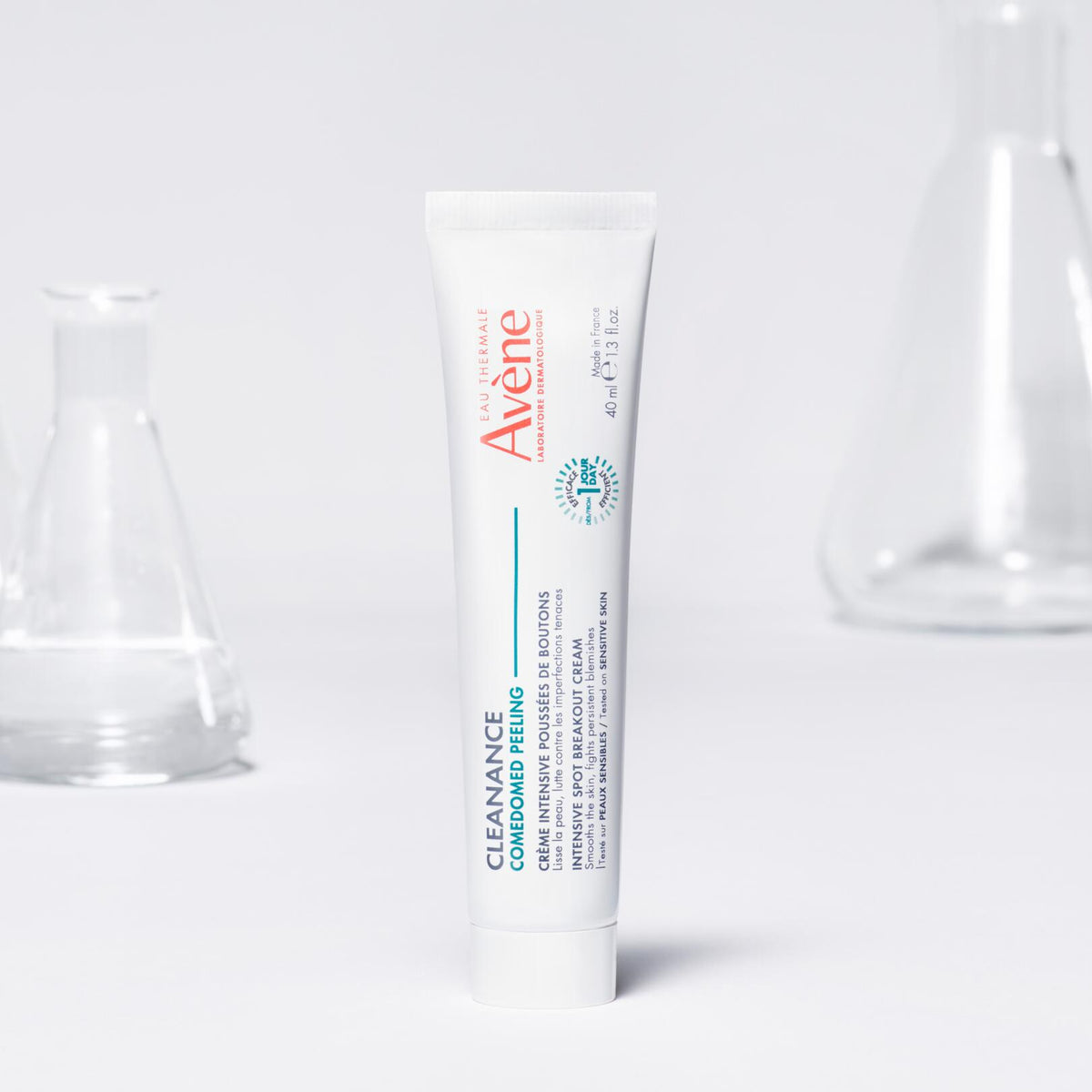 Avène Cleanance, tube standing among lab glassware