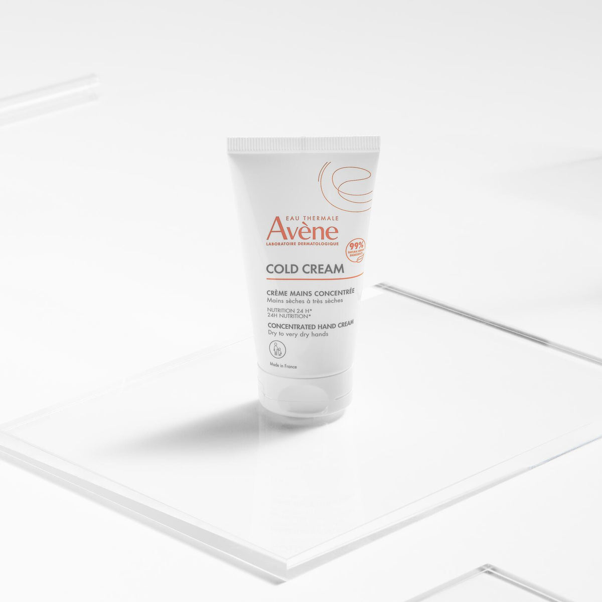 Avène Cold Cream, tube standing on a clear acrylic plate