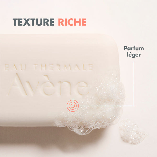 Avène Cold Cream, close-up of the bar with lather and captions in French