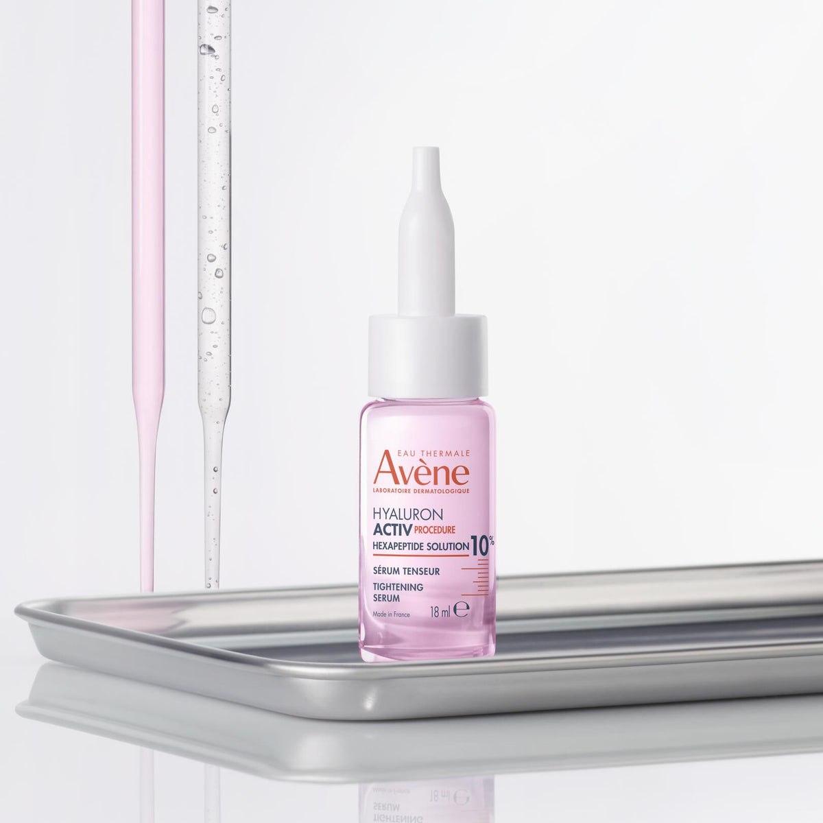 Avène Hyaluron Activ, dropper bottle on a steel tray between pipettes