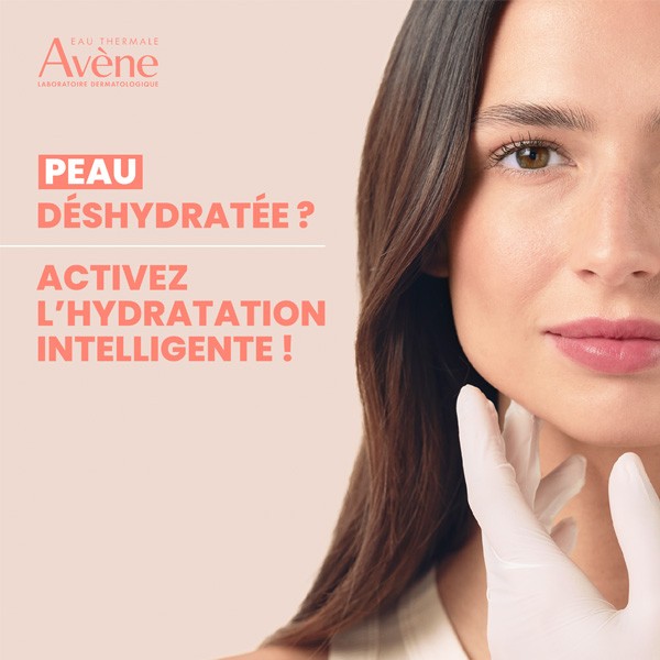 Avène Hydrance, woman's face and gloved hand with a caption in French