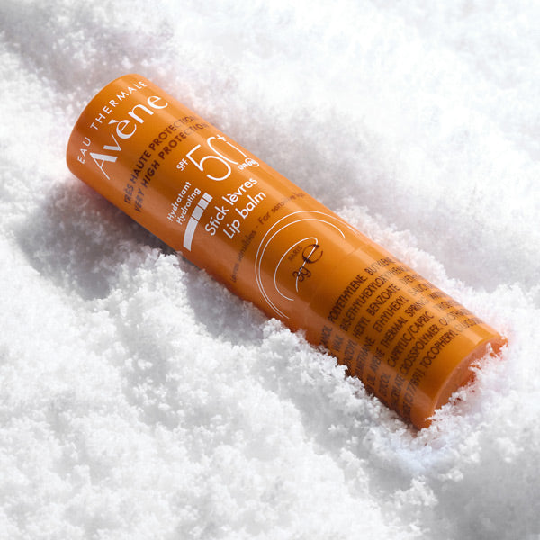 Avène Solaire, stick lying in snow