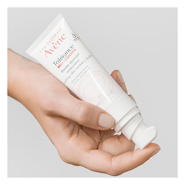 Avène Tolerance Control, hand holding the tube with the pump facing down