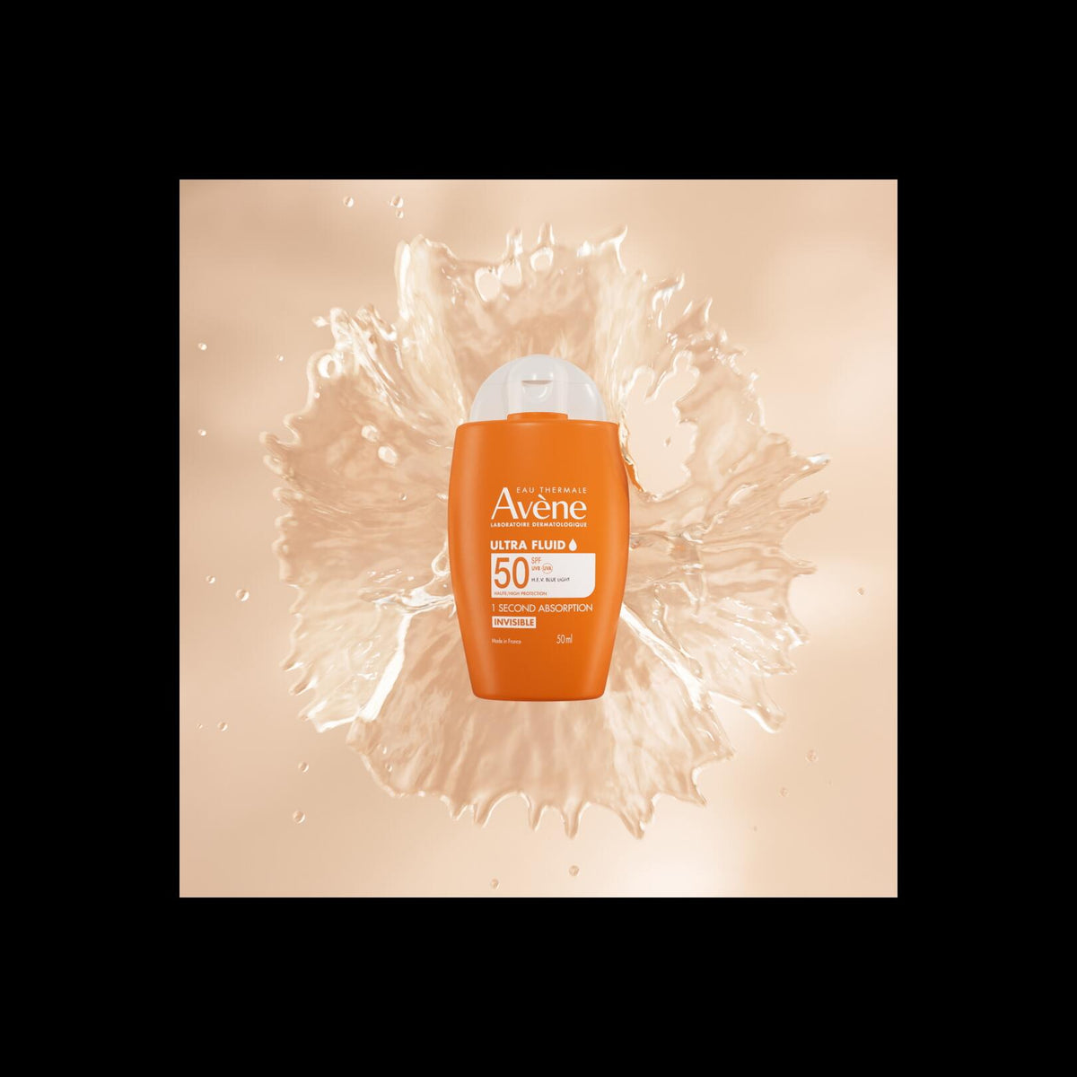 Avène Solaire, bottle on a beige fluid splash, with a black border