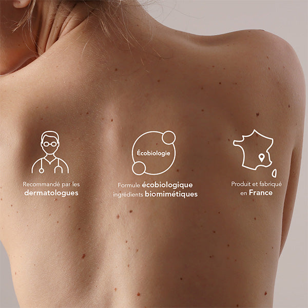 Bioderma ABCDerm Cold Cream, woman's bare back with three icons in French