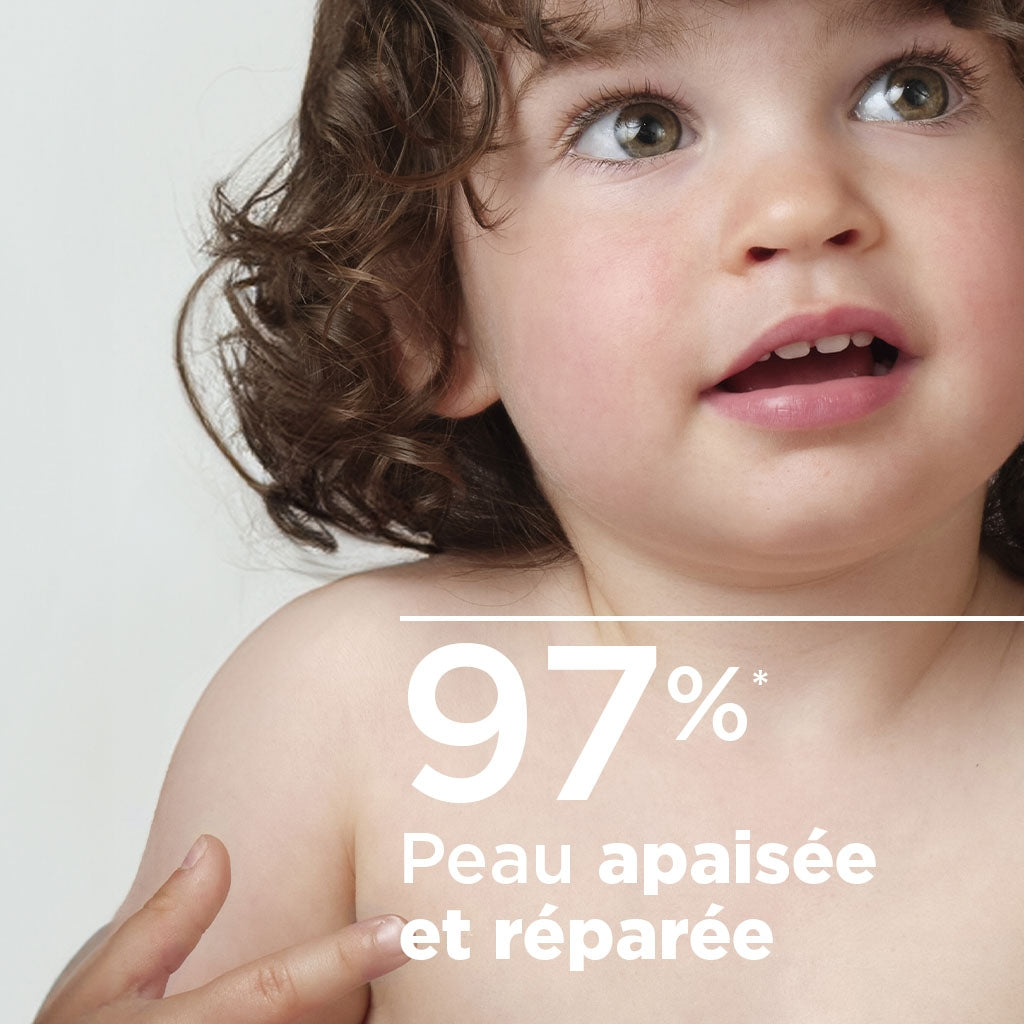 Bioderma ABCDerm, curly-haired toddler looking up with text in French