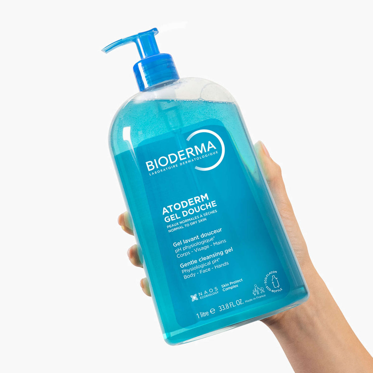 Bioderma Atoderm, hand holding the pump bottle