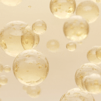 Bioderma Atoderm, golden oil bubbles on a beige background
