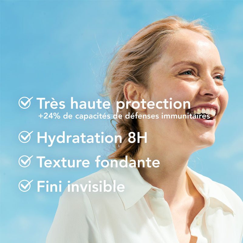 Bioderma Photoderm, smiling woman under a blue sky with benefits in French