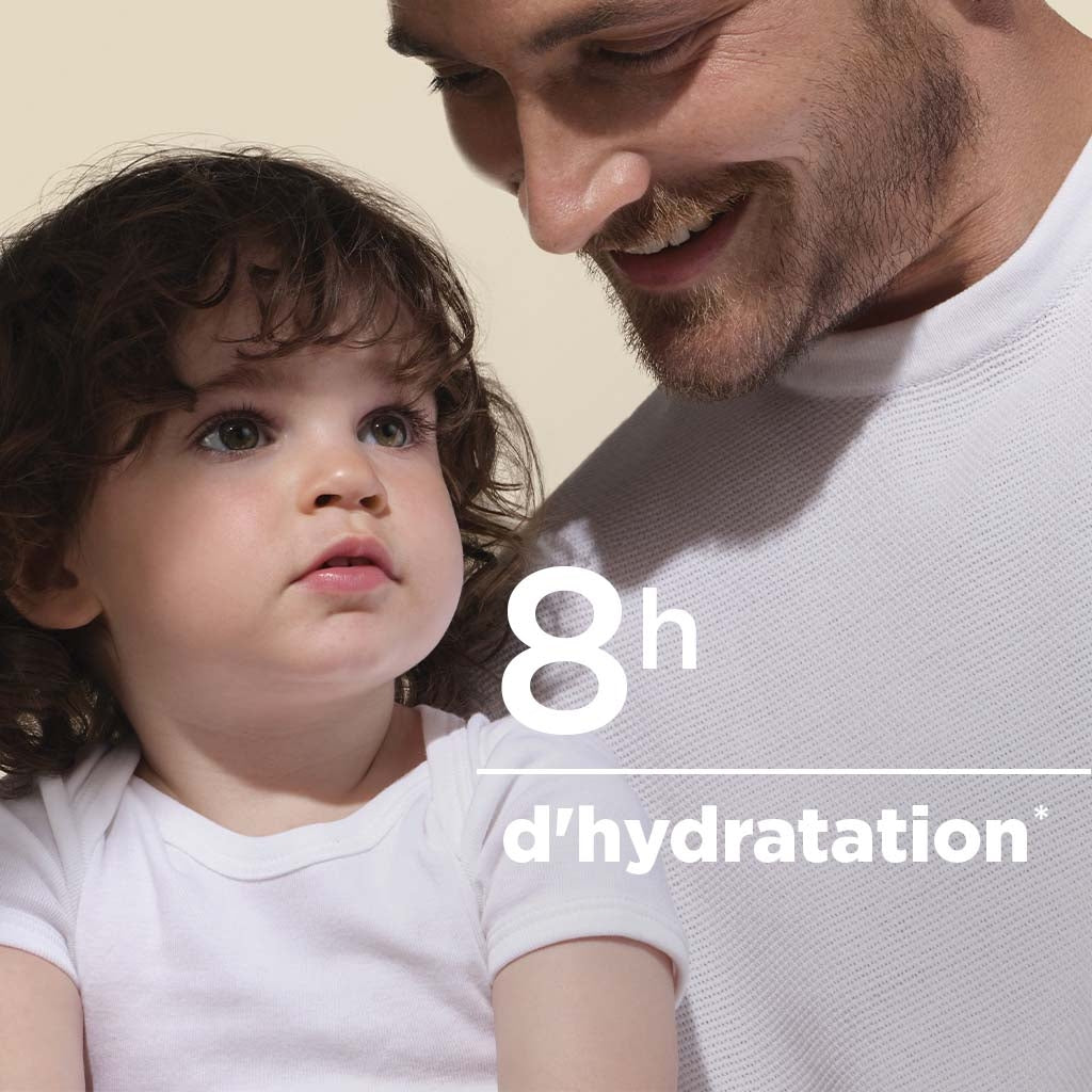 Bioderma Photoderm, father holding a curly-haired toddler with study results in French