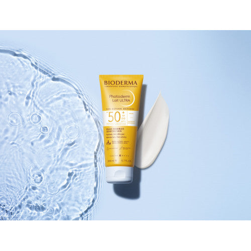 Bioderma Photoderm, tube and lotion swatch on rippled water