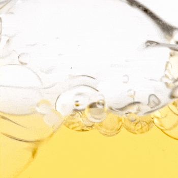 Bioderma Photoderm, clear sun water with bubbles on a yellow background