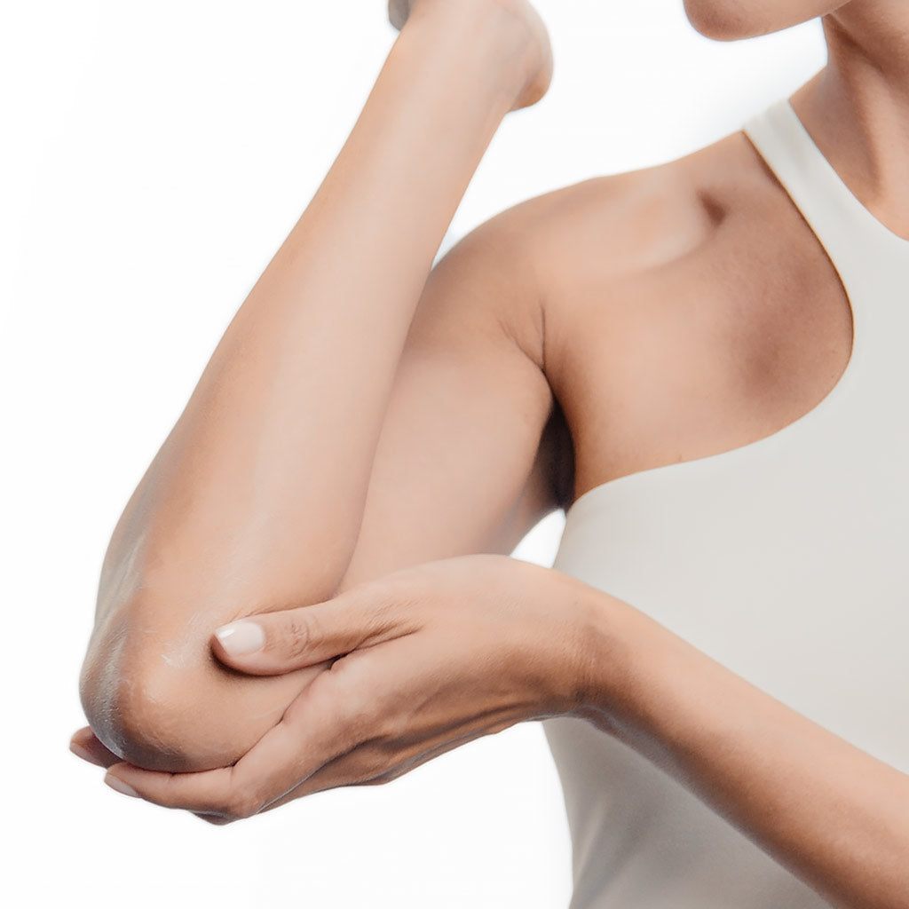 Bioderma PigmentBio, woman holding her elbow with her arm raised