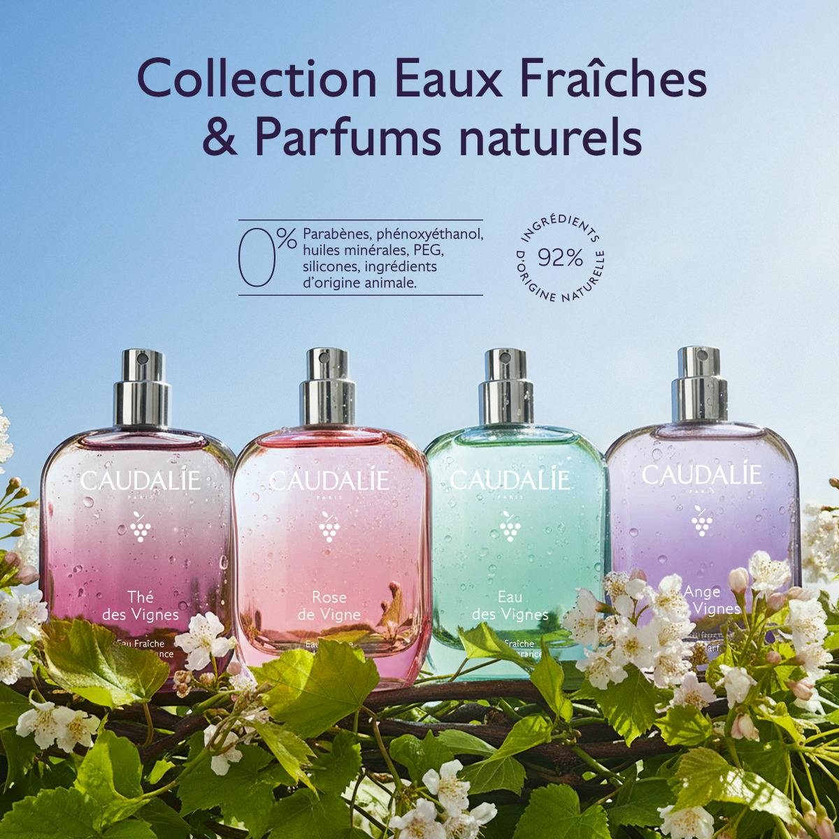 Caudalie Eau des Vignes, range of four fragrance bottles among flowers