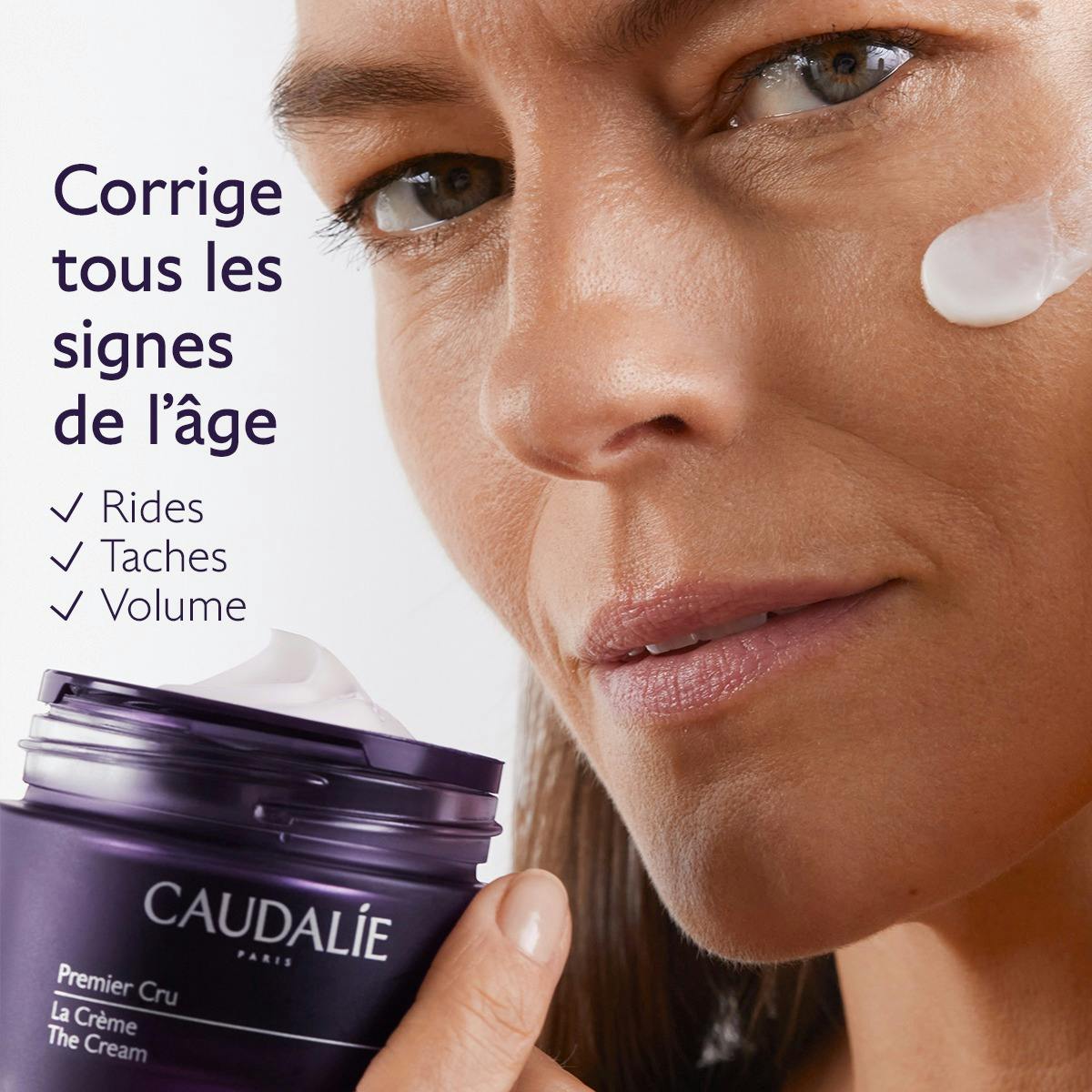 Caudalie Premier Cru, woman's face with a dab of cream and the jar, benefits in French