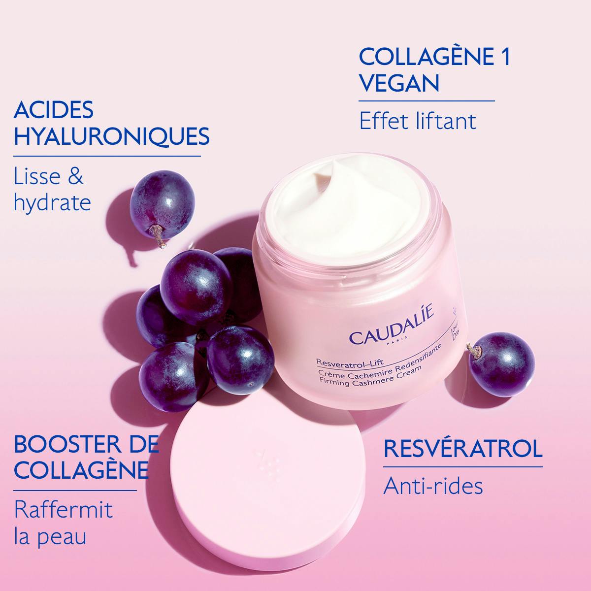 Caudalie Resveratrol-Lift, key ingredients around the open jar and black grapes