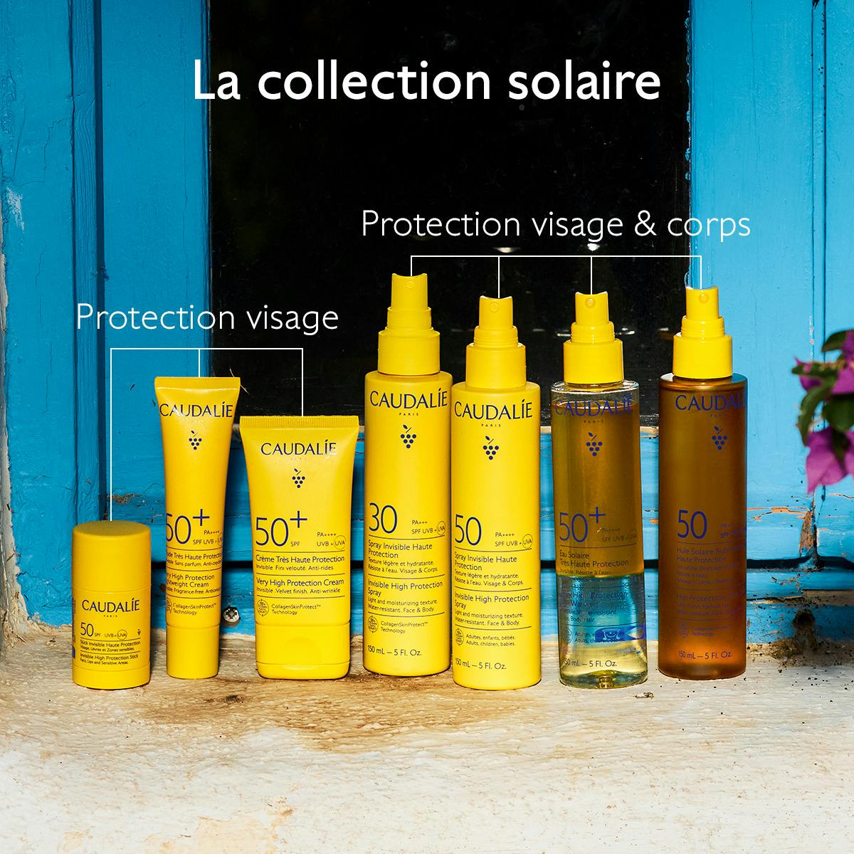 Caudalie Solaire, sun care collection lined up on a blue windowsill