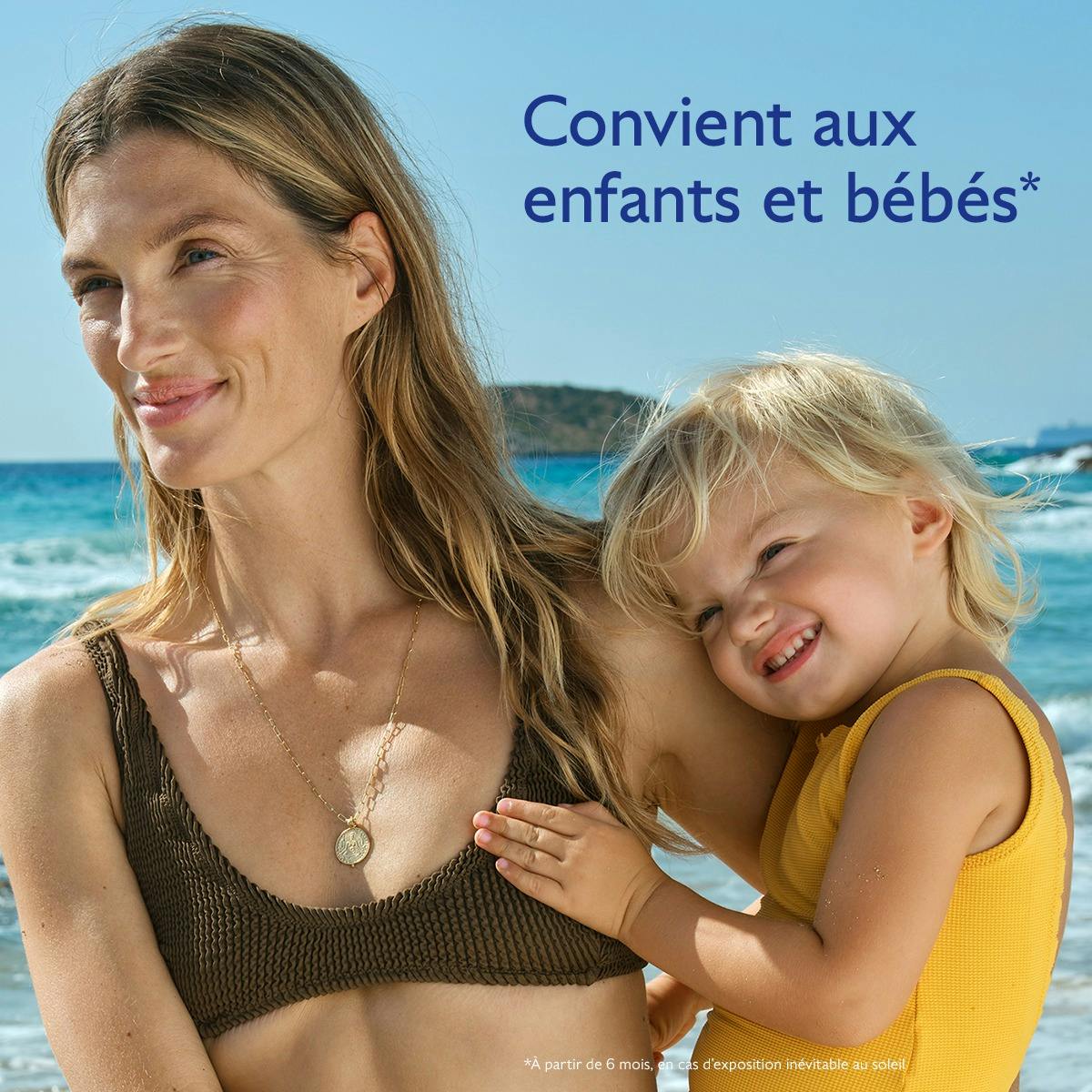 Caudalie Solaire, mother and child on a beach
