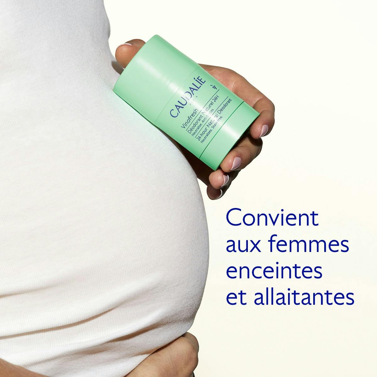 Caudalie Vinofresh, woman holding the stick against her rounded belly, text in French