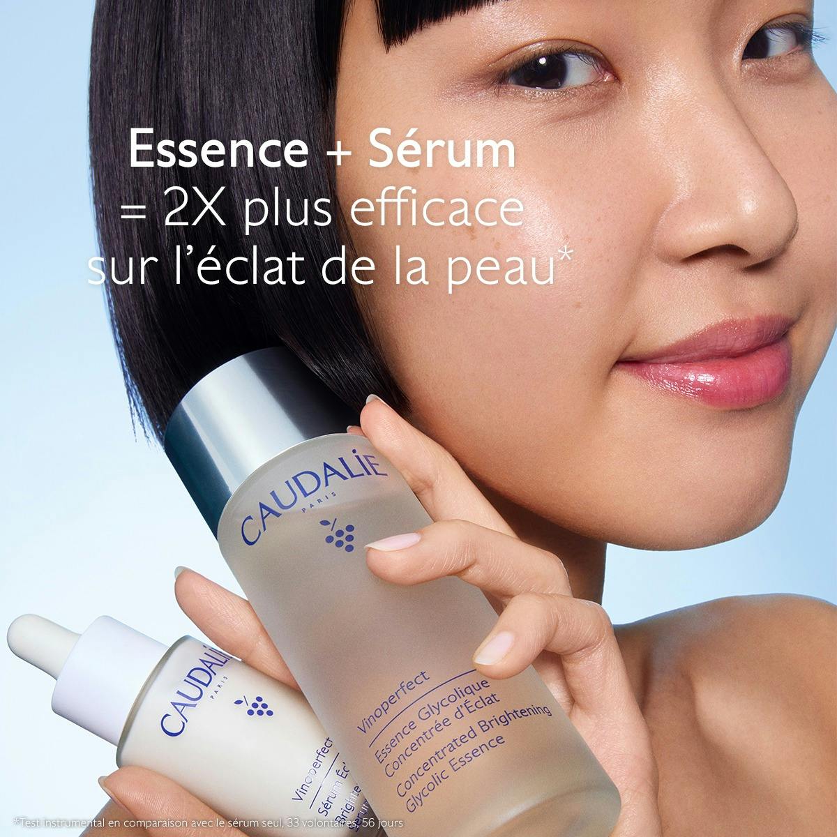 Caudalie Vinoperfect, woman holding the essence and serum bottles, text in French