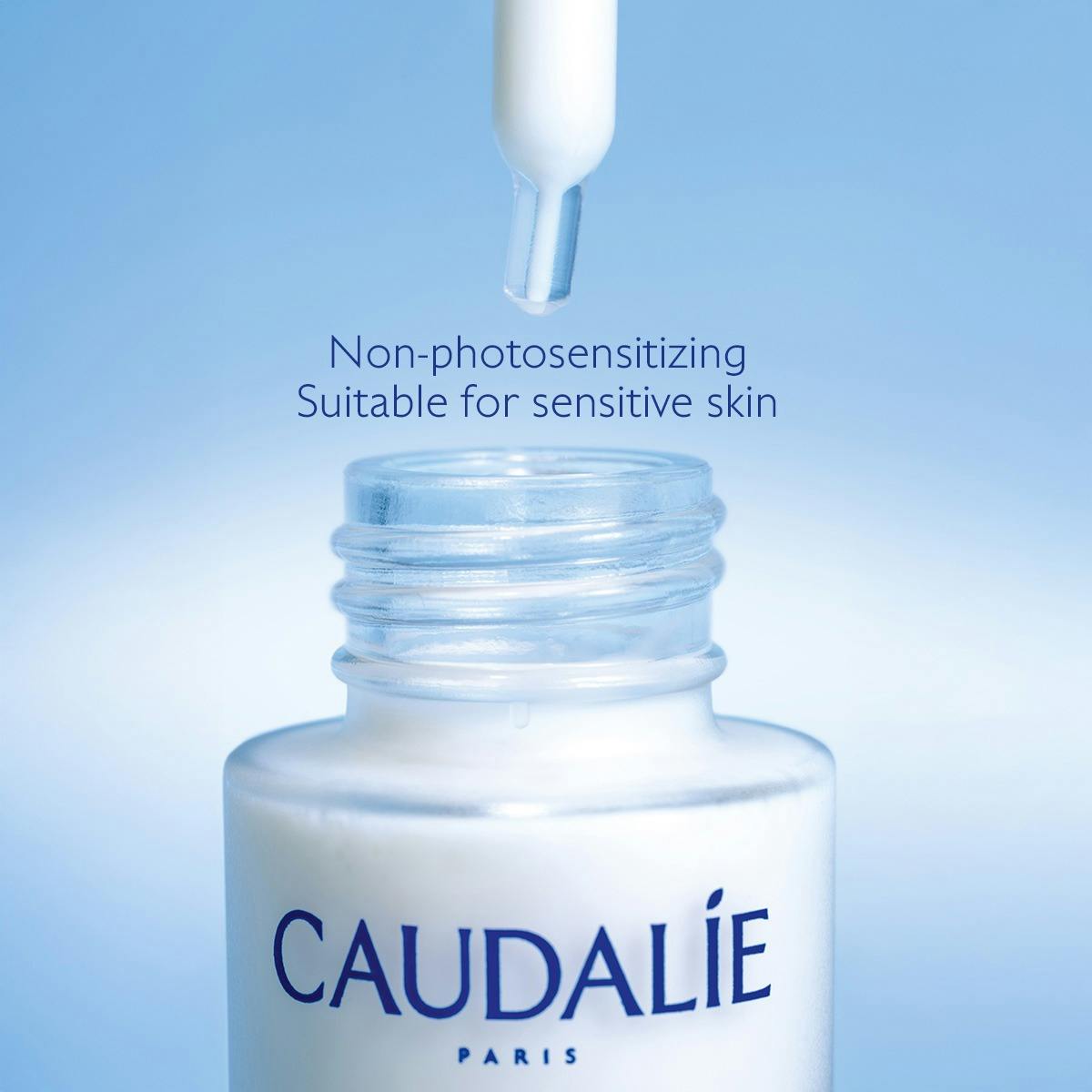 Caudalie Vinoperfect, dropper above the open glass bottle