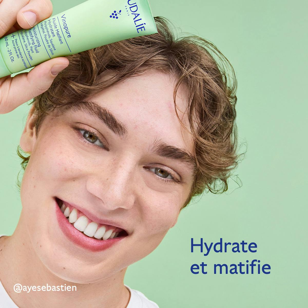 Caudalie Vinopure, smiling young man holding the tube
