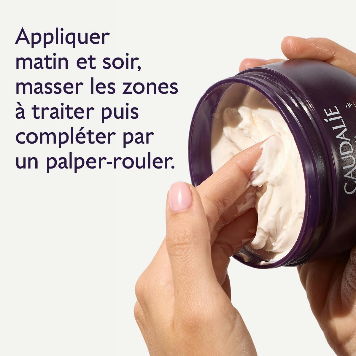 Caudalie Vinosculpt, finger dipping into the open jar with directions in French