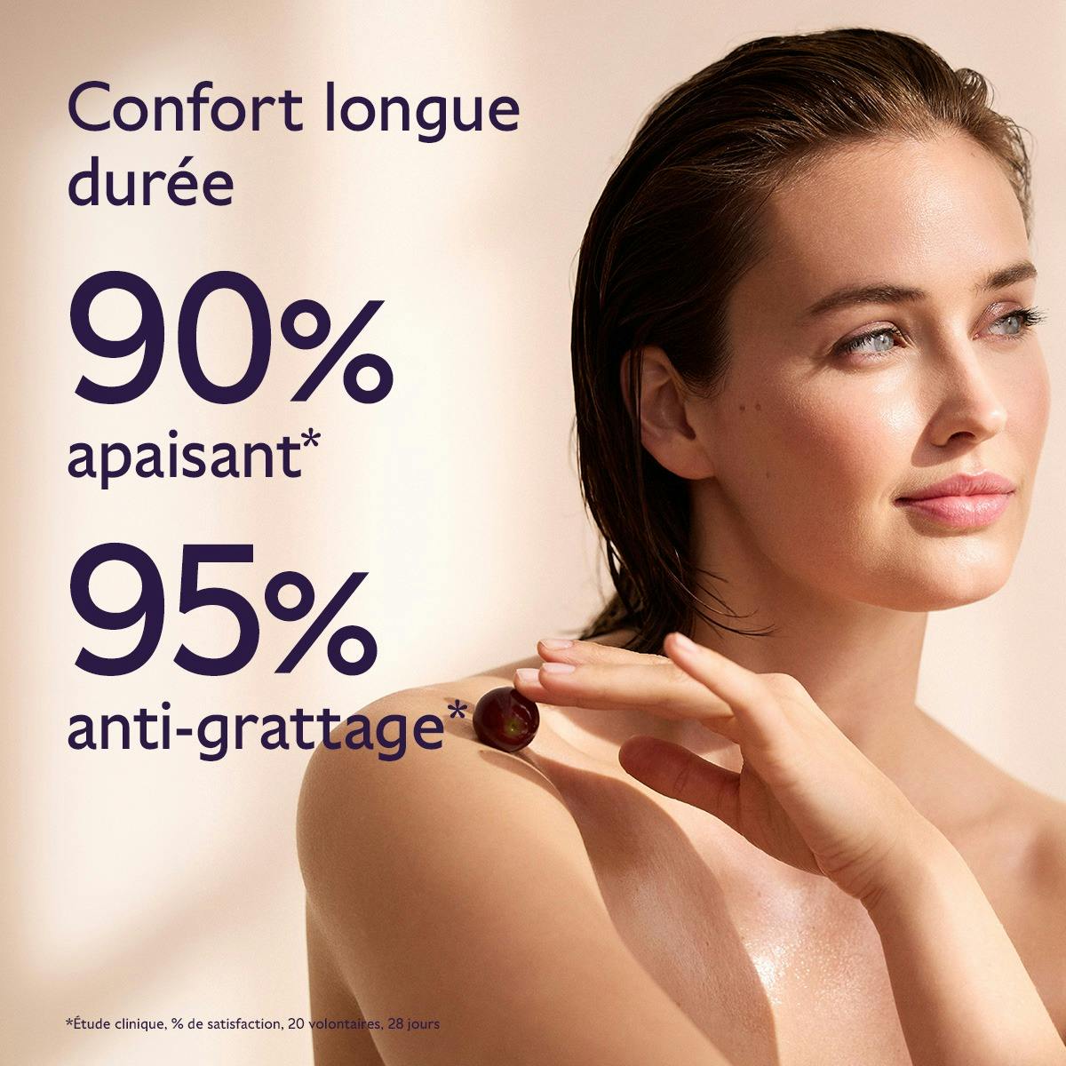 Caudalie Vinotherapist, woman holding a grape to her bare shoulder