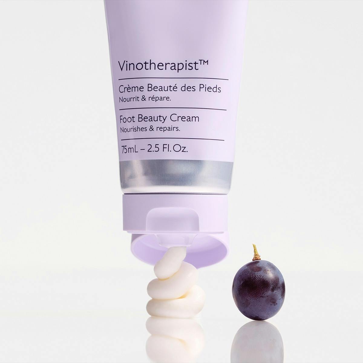 Caudalie Vinotherapist 75ml, upturned tube with a swirl of cream and a grape