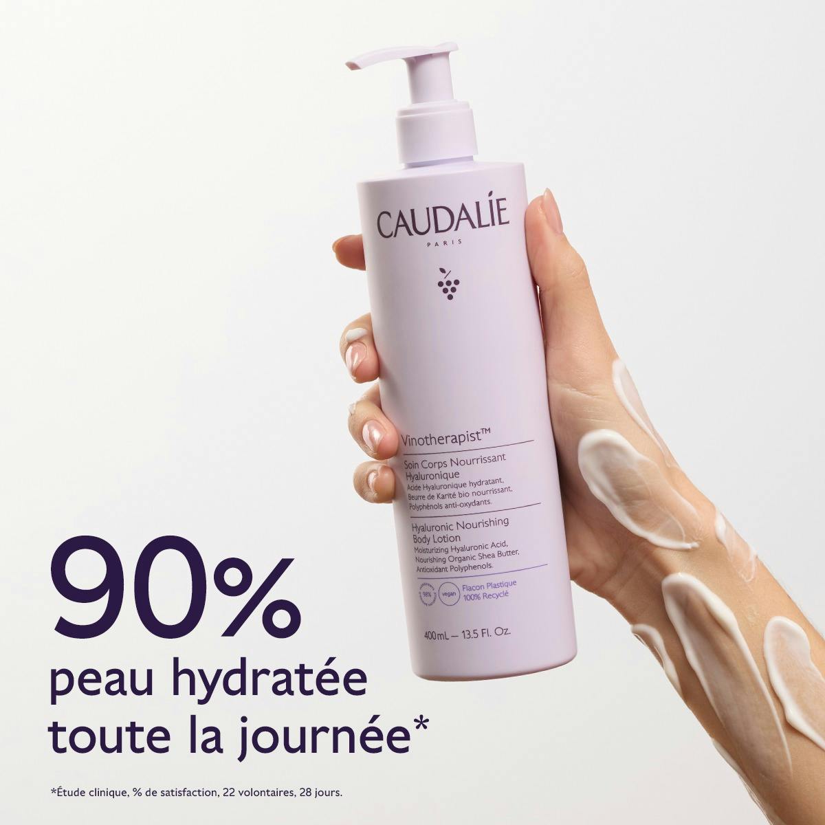 Caudalie Vinotherapist, hand holding the pump bottle with lotion on the arm