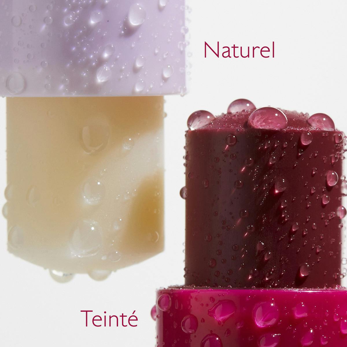 Caudalie Vinotherapist, natural and tinted lip balms uncapped side by side