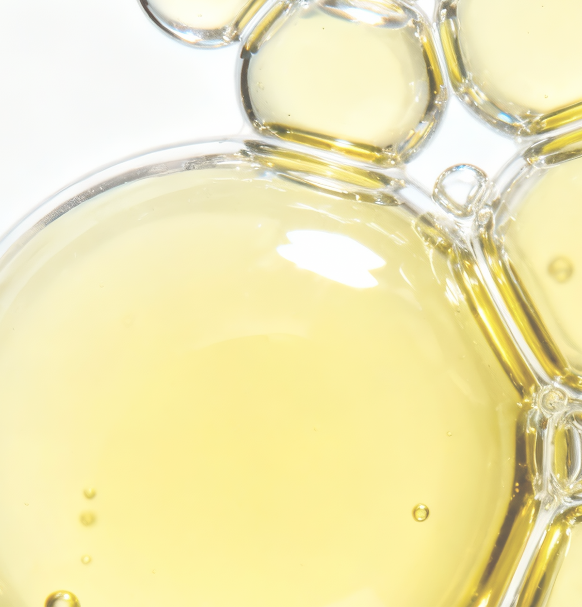 COSRX Advanced Snail, snail mucin bubbles in amber light
