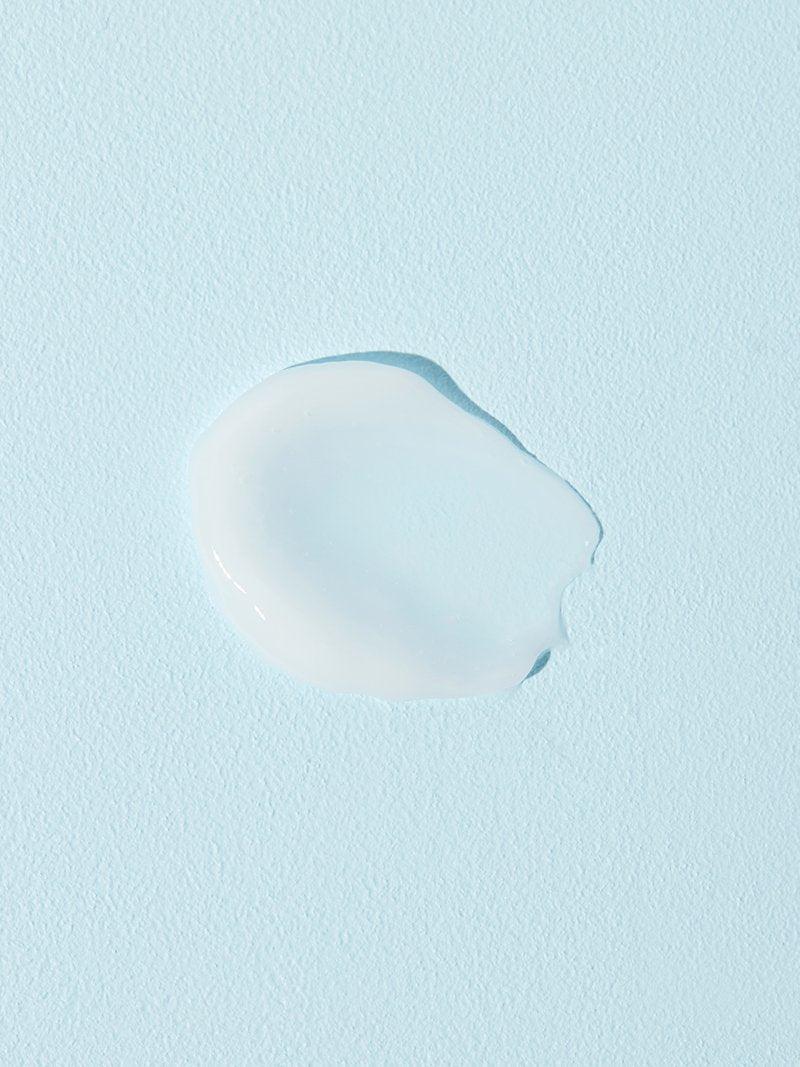 COSRX Oil-Free Ultra-Moisturizing Lotion, drop of lotion on a blue background