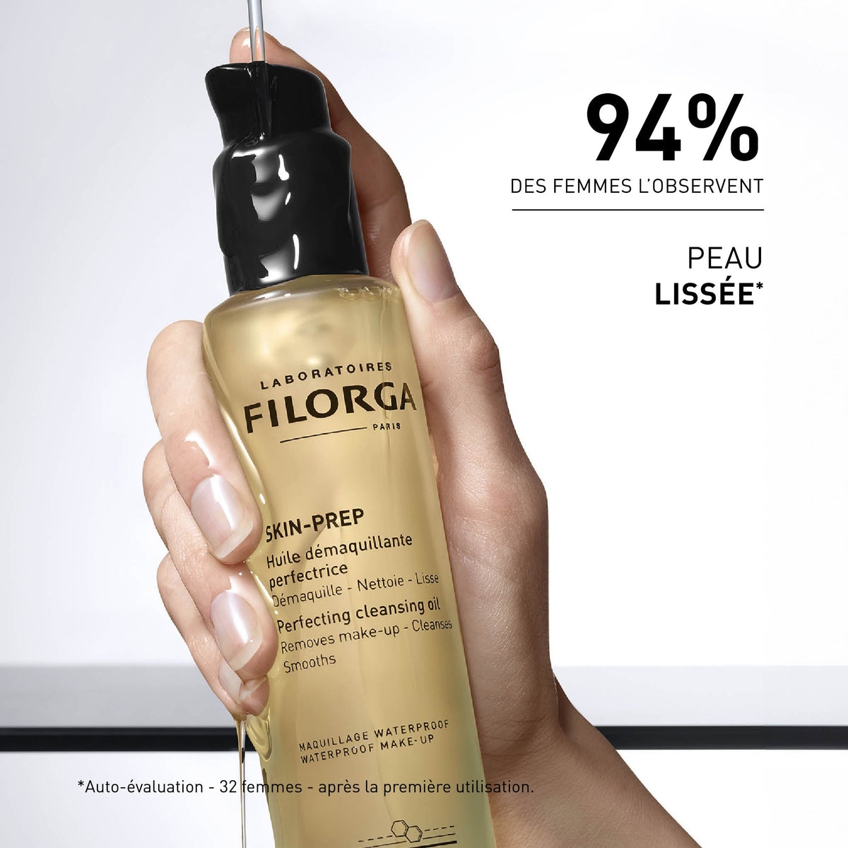 Filorga Skin-Prep, hand holding the pump bottle with study results in French