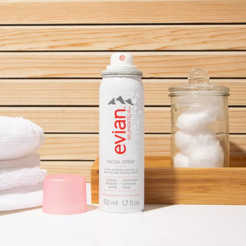 Evian Facial Spray alpine mineral water mist aerosol can on white background, alternate angle