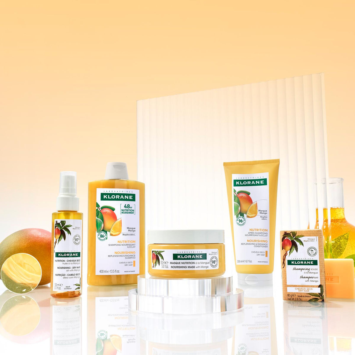 Klorane Mango, range of five products on an orange background