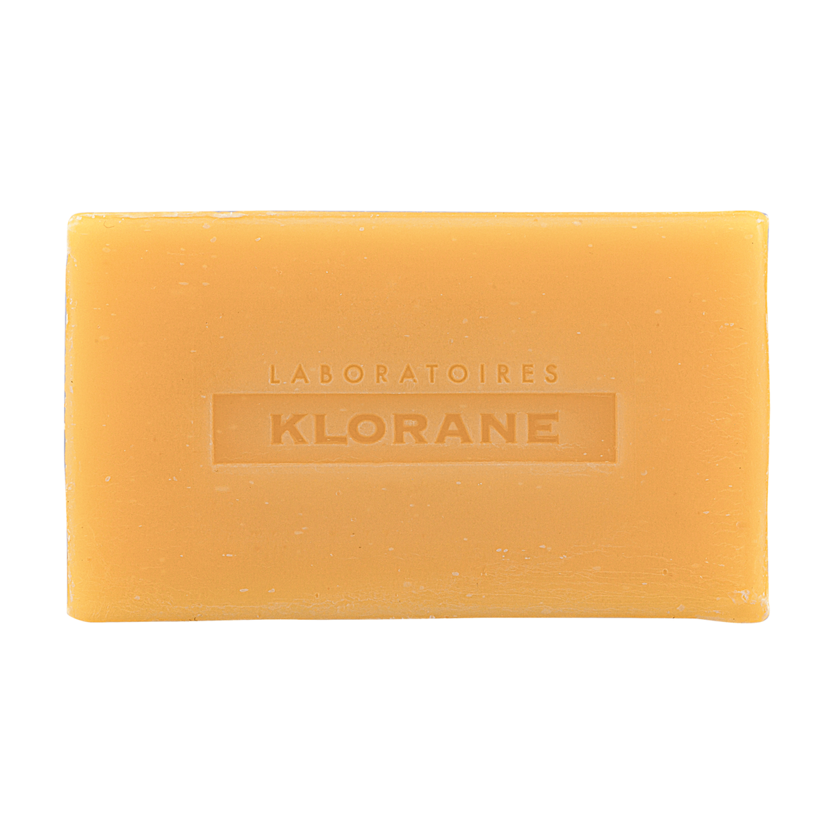 Klorane Mango, unwrapped bar with the embossed logo