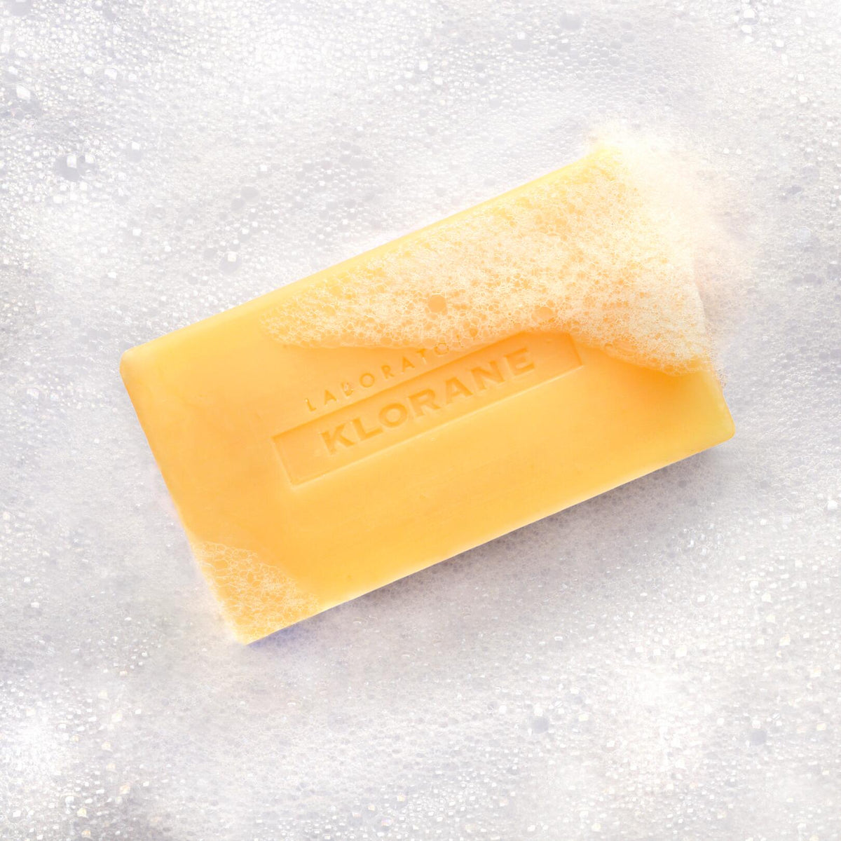 Klorane Mango, lathered bar on a bed of foam