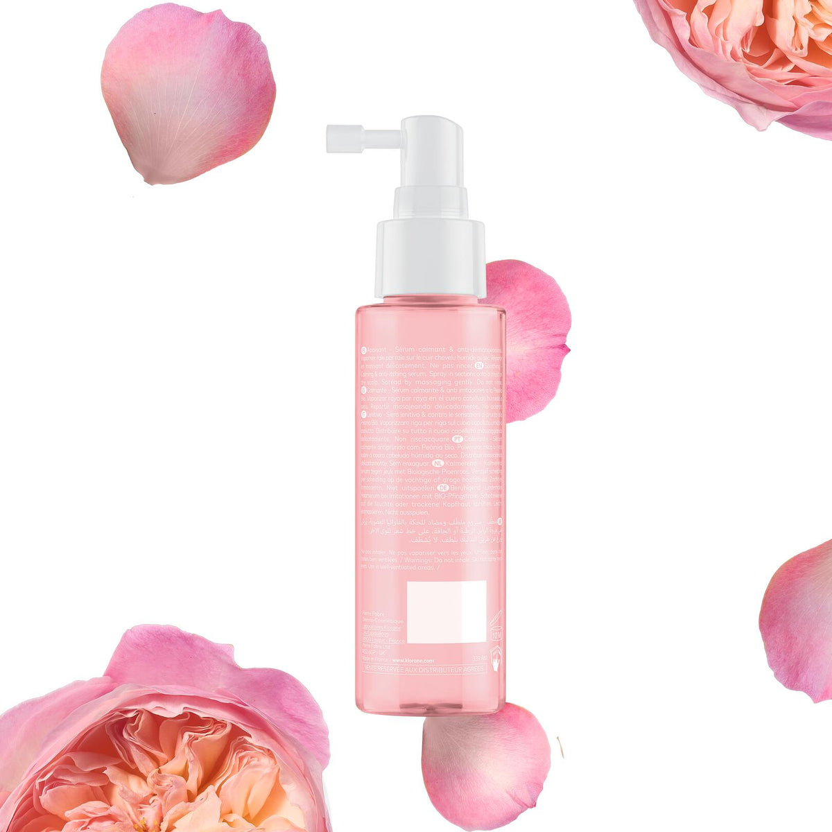 Klorane Peony, back of the spray bottle among peony petals
