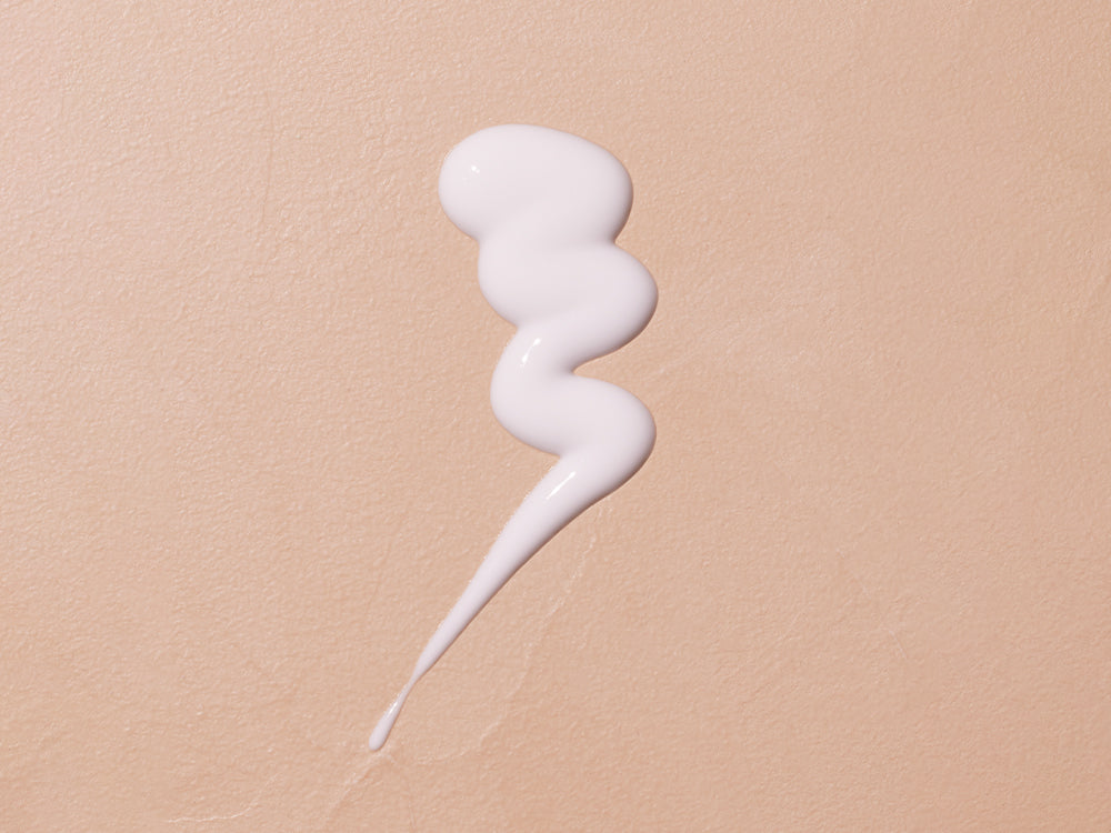 Mustela Cold Cream, milk texture swatch