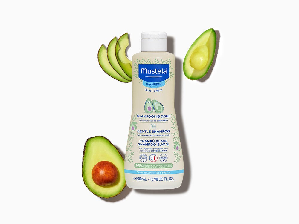 Mustela Gentle Shampoo, bottle with avocado halves and slices