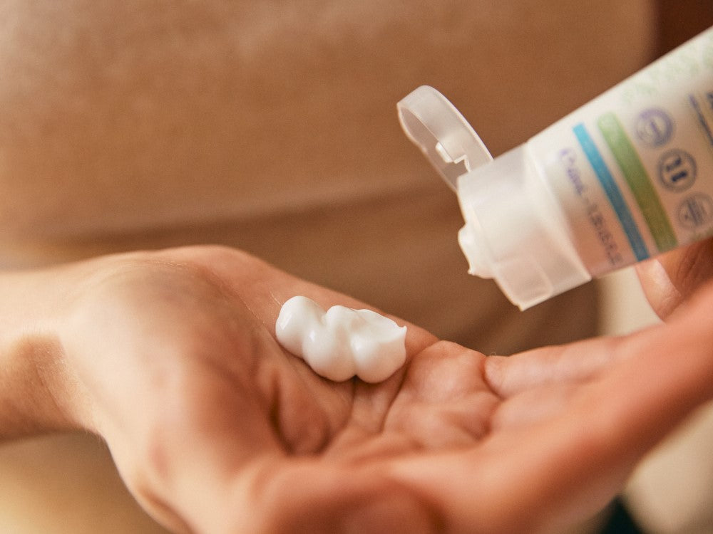 Mustela Hydra Bébé, cream squeezed from the tube into a palm