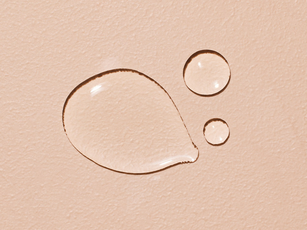 Mustela Massage Oil, oil texture swatch