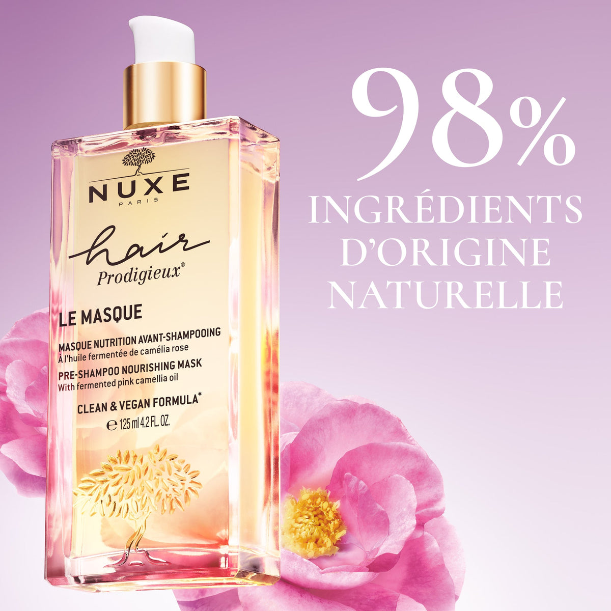 NUXE Hair Prodigieux, pump bottle among pink camellia flowers, text in French