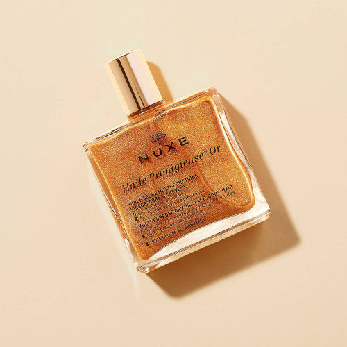 NUXE Huile Prodigieuse Gold Illuminating Dry Oil for Face Body and Hair, side view